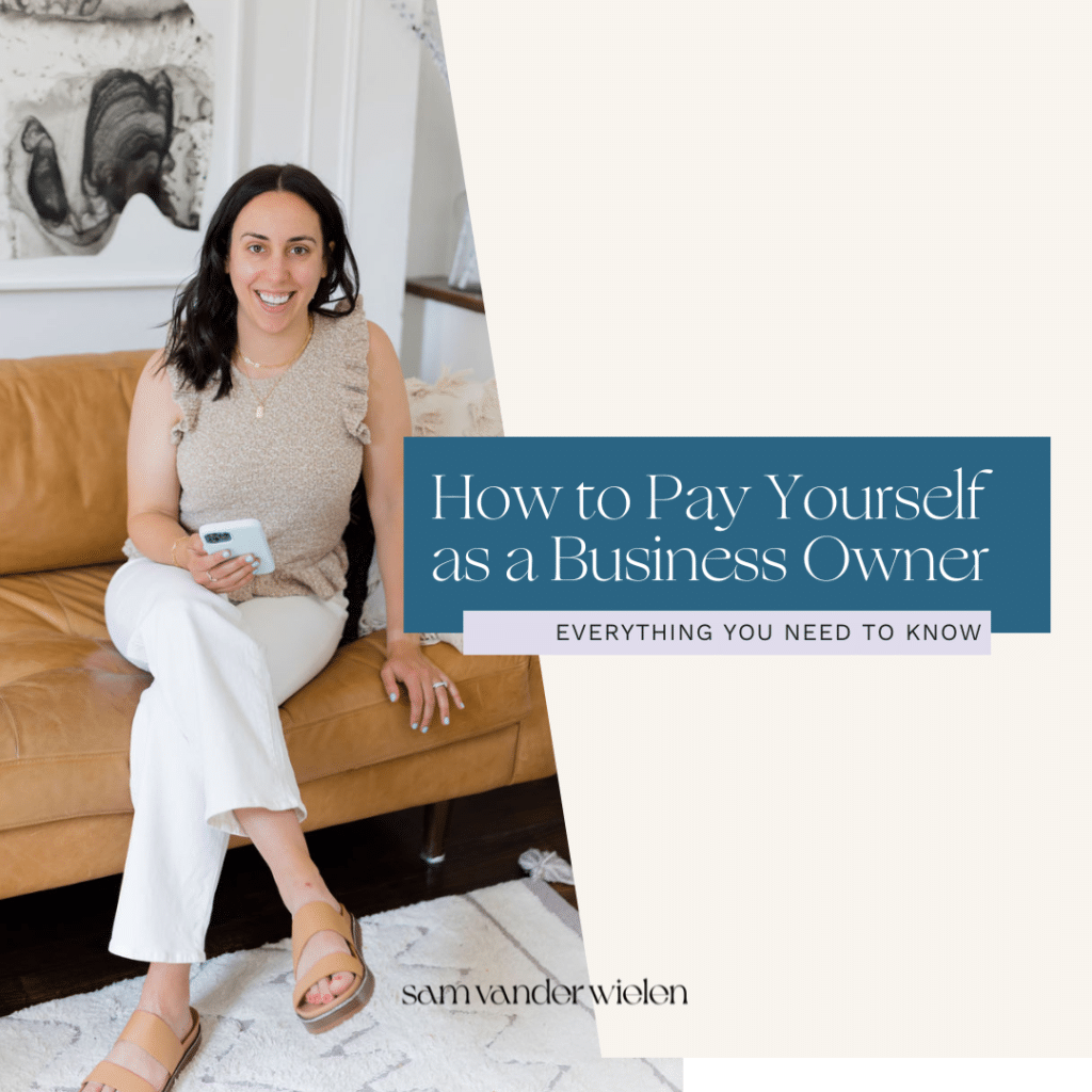 woman sitting on couch and holding an iphone with text overlay "How to Pay Yourself as a Business Owner"